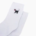 white cat socks up close